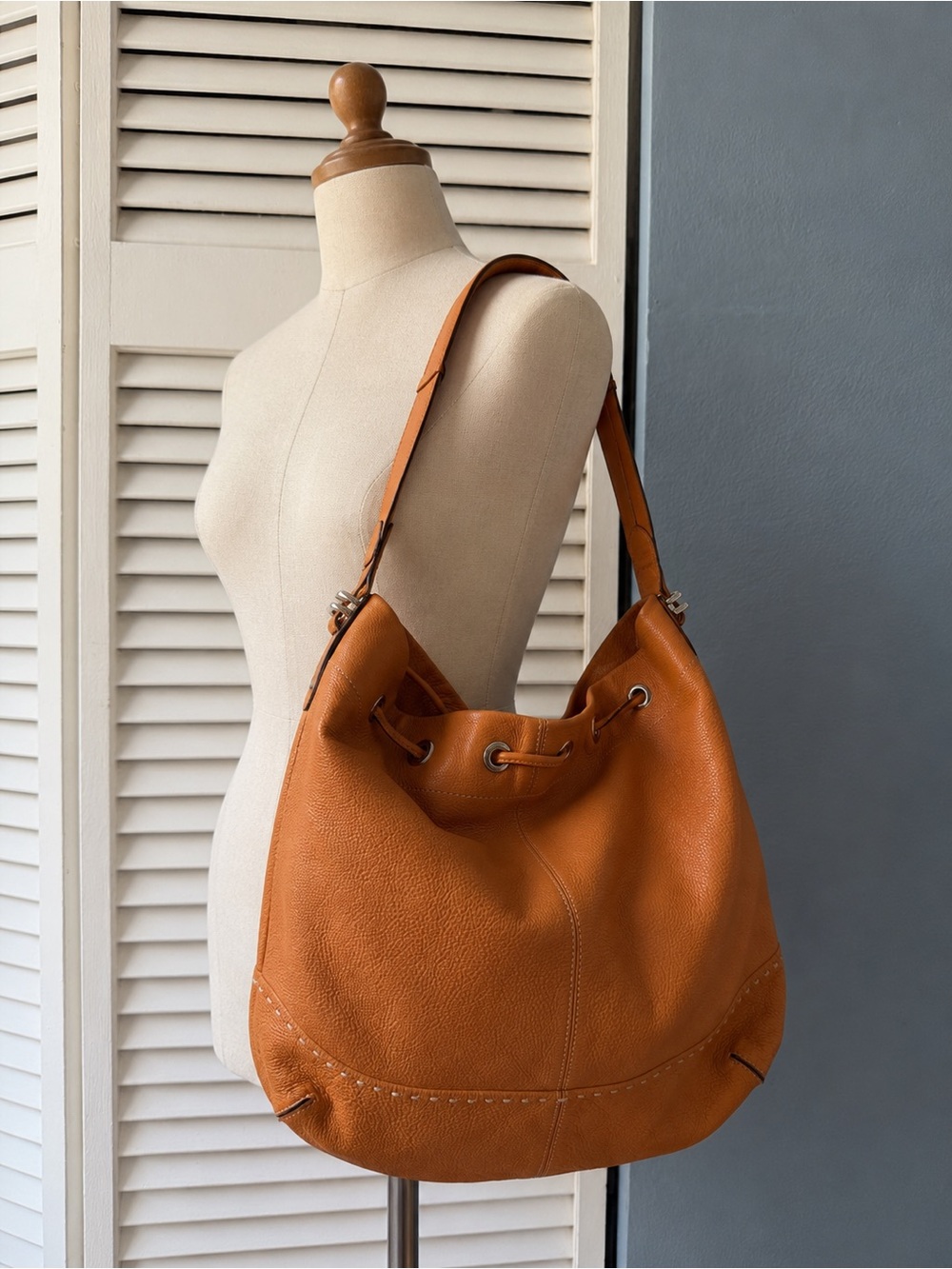 Cole Haan Orange Pebbled Leather Drawstring Hobo Bucket Bag